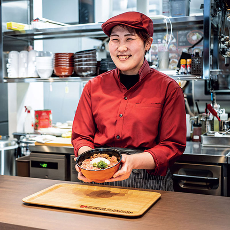 They greet tourists with a cheerful smile across the counter.