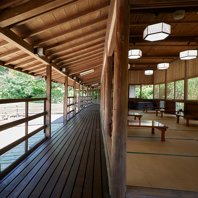 Five thatched-roof pavilions